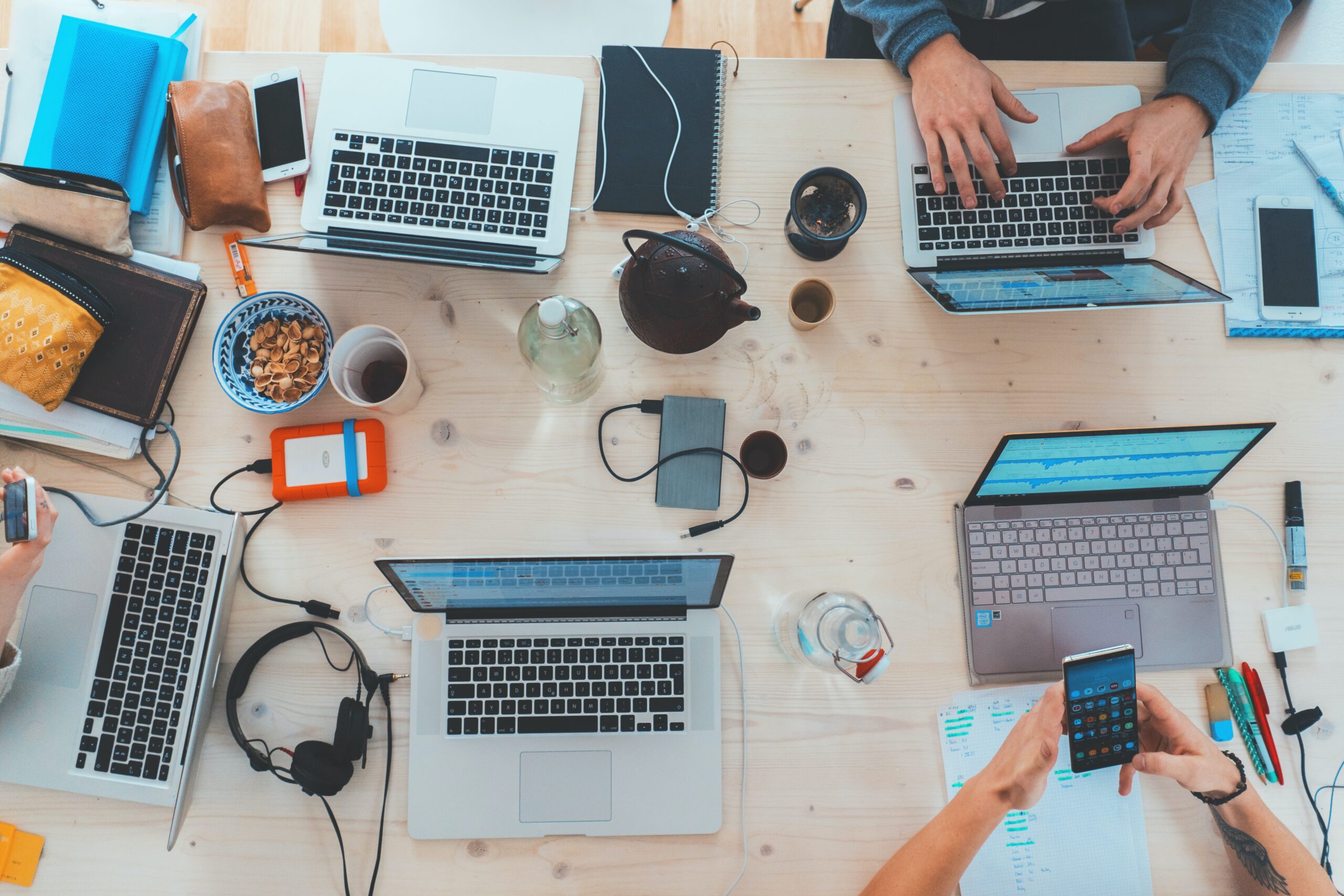 Group of computer users at a work table